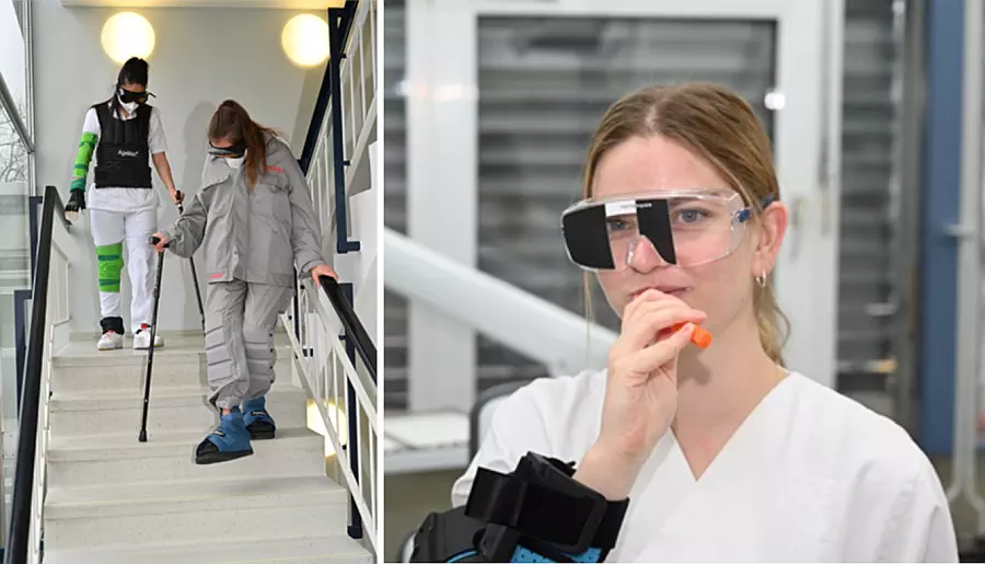 Studenten nutzen im Studium Alterszahnmedizin einen Alterssimulationsanzug