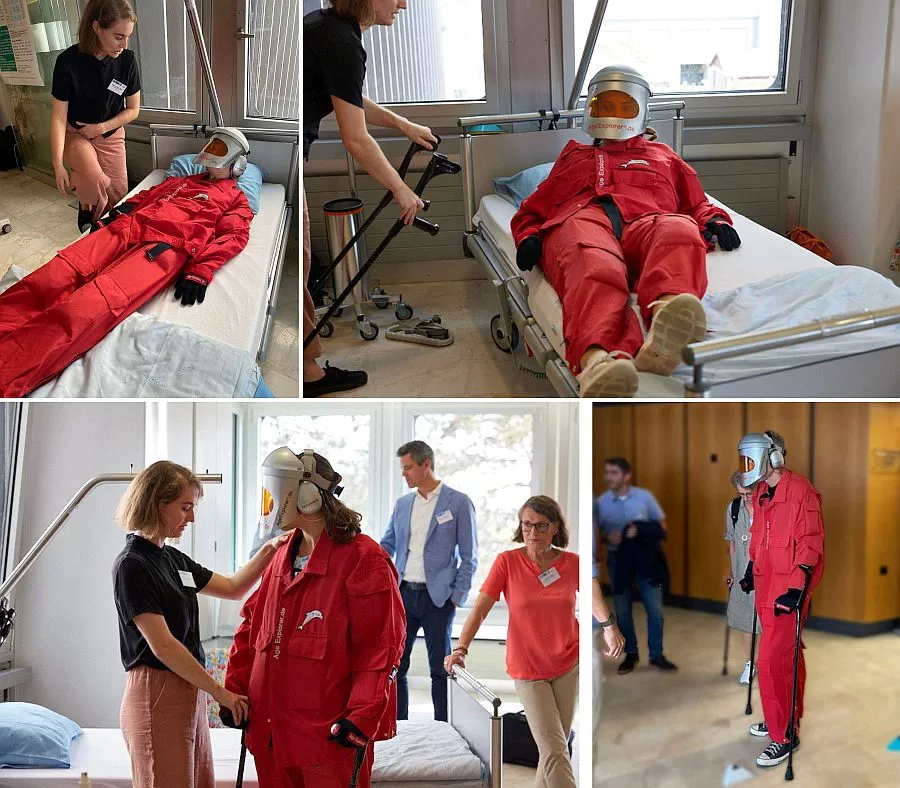 Swiss Orthogeriatrics Day: Empathietraining mit Alterssimulationsanzug: Physiotherapeutin mobilisiert im Bett liegenden Patienten, lässt ihn aufstehen und einige Schritte gehen.